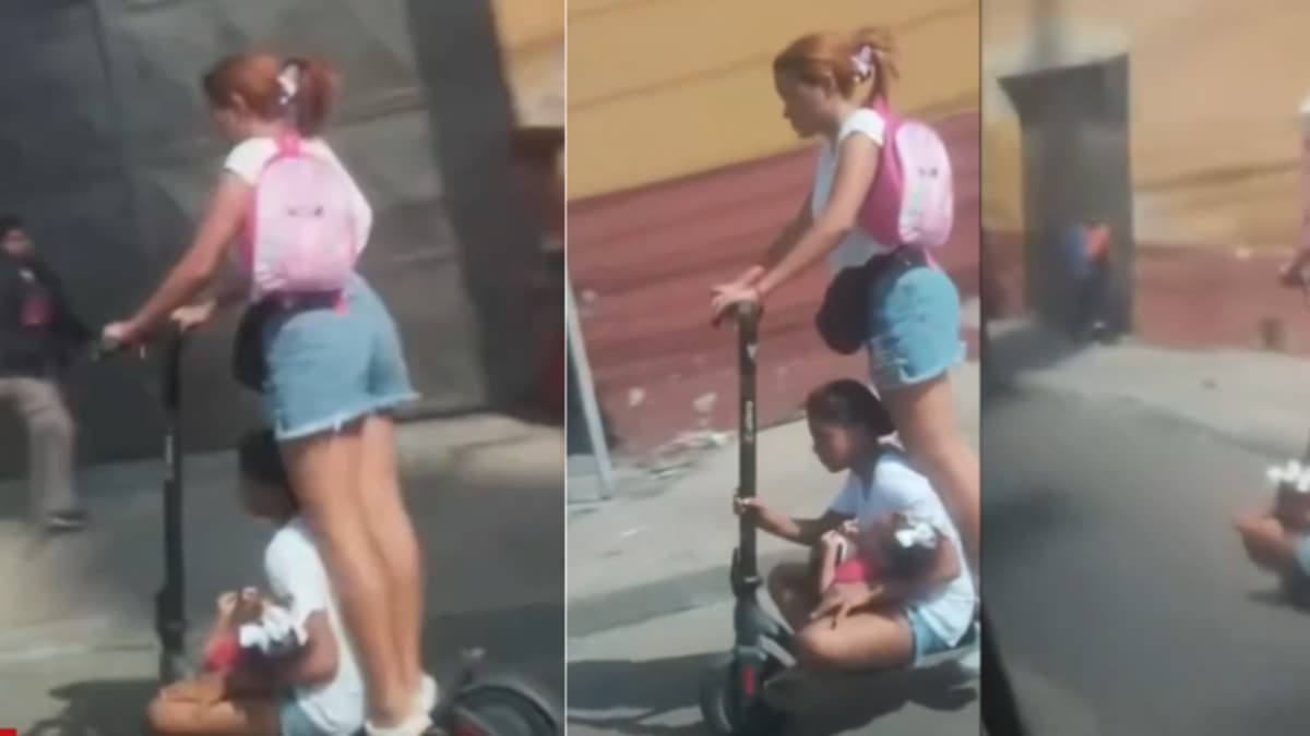 Video genera indignación en Barranquilla: mujer transporta dos niños en patineta eléctrica por calle 30