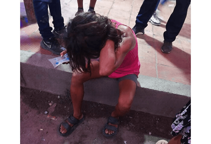 Mujer en calle atacada con machete en el Mercado Público de Fundación