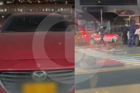 Policía captura a dos atracadores y recupera el carro rojo usado en violento robo en Usaquén